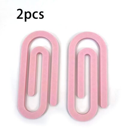 2pcs Blush Pink 3D printed giant paperclip canvas fixator for gentle canvas management.