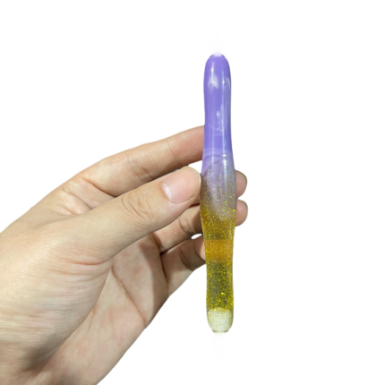 Close up of Royal Purple resin diamond art pen with shimmering gold