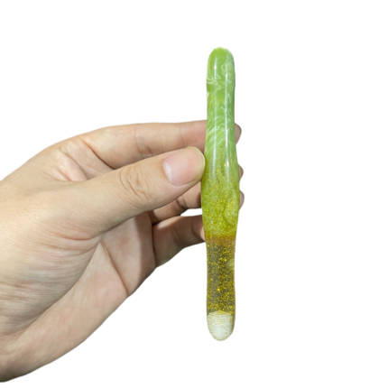 Close up of Sage Green resin diamond painting pen with gold glitter